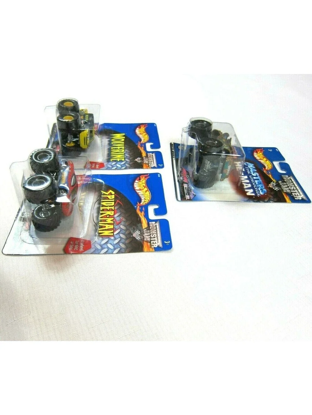 Lot of 3 Vintage Hot Wheels Monster Jam Wolverine, Spider-Man & He-Man 1:64 NEW